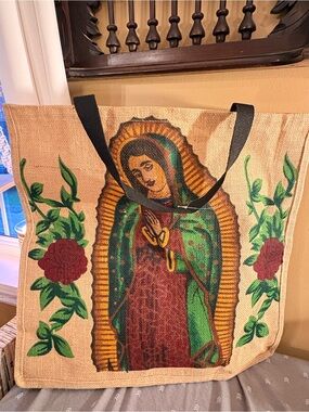 100% jute Religious Tote with Green and Gold Virgin Mary Design. Excellent shape
